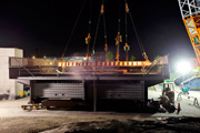 The flyover span weighs 240 tons. It has to be lifted and conveyed exactly to the right spot.