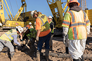 We pour water to make clay where we drill down. We connect tens of meters of water discharge hoses to use.